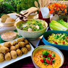 Summery potluck dishes on a table.